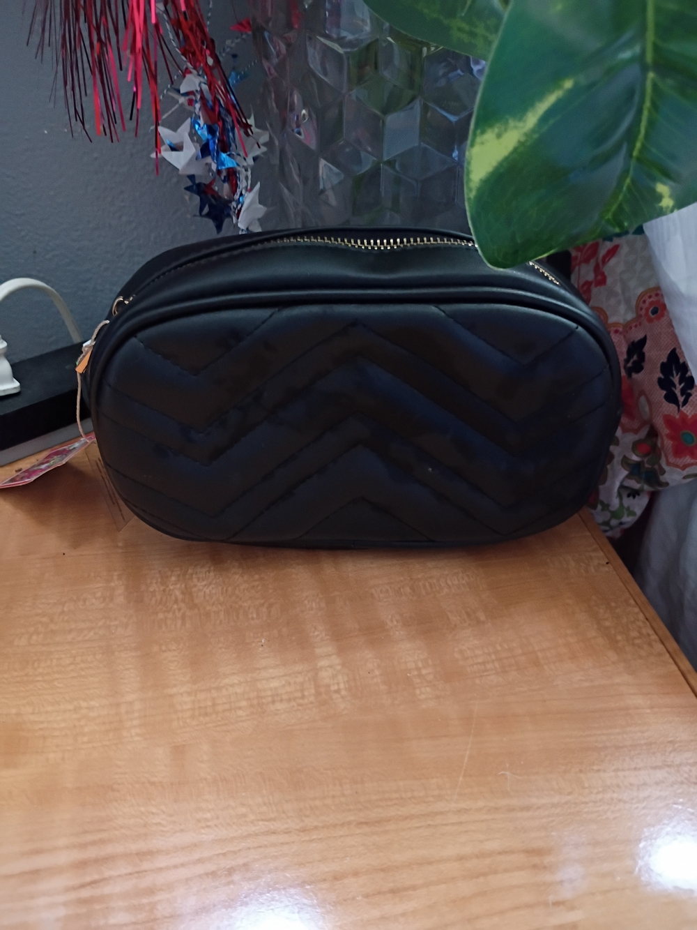 Black Quilted Oval Cosmetic Bag
